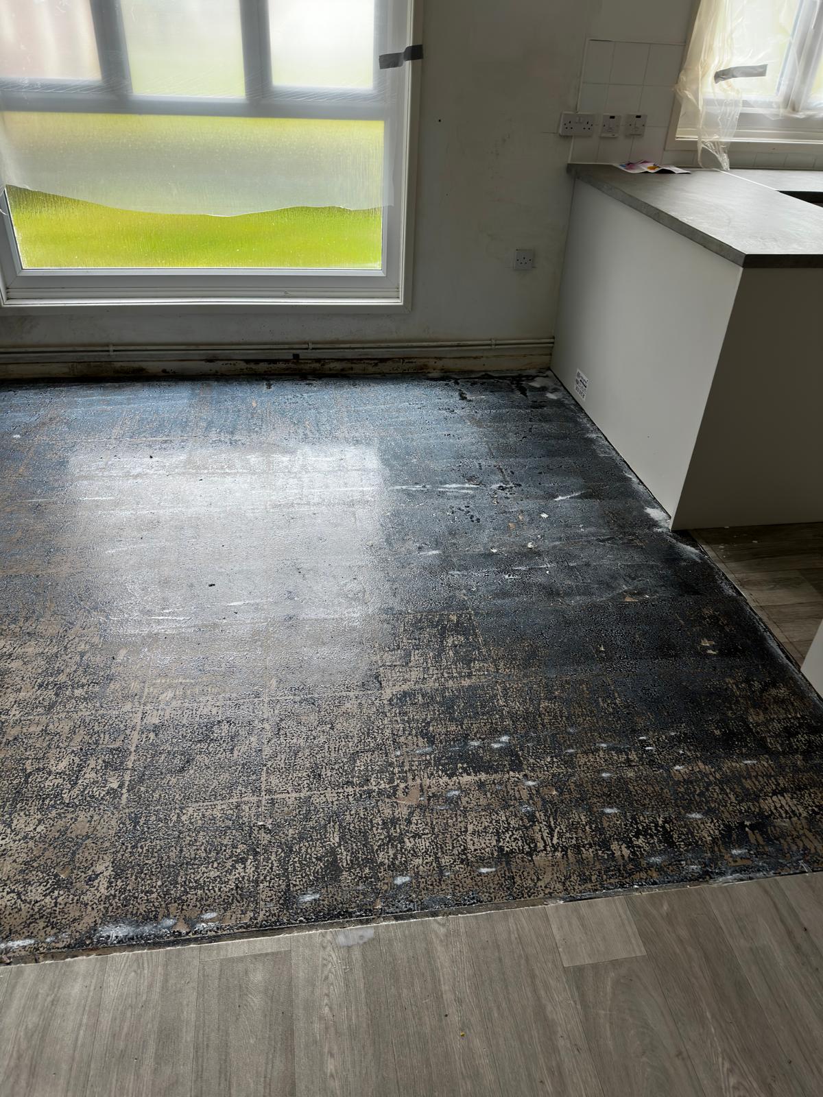 Floor after asbestos tile removal