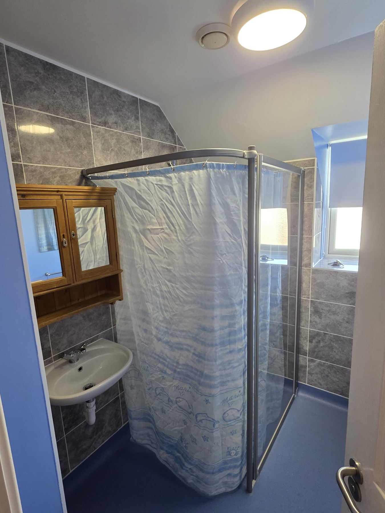 Completed tiled shower room